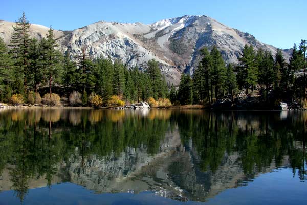 An awesome view of a mountain reflected in Secret Lake