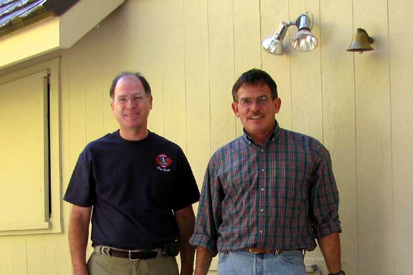 Jim and Dave on the porch after we get the cabin sealed for the winter