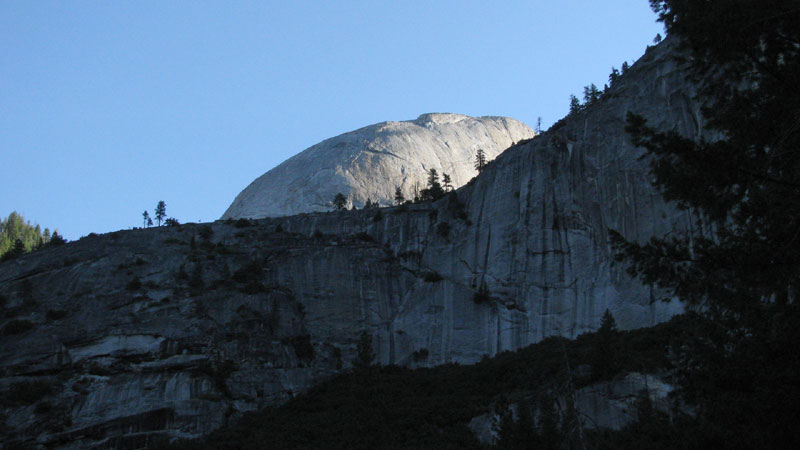 Half Dome rises above the bench of Nevada Falls