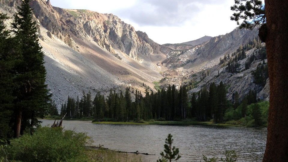 The lake with clouds accenting the surrounding mountains